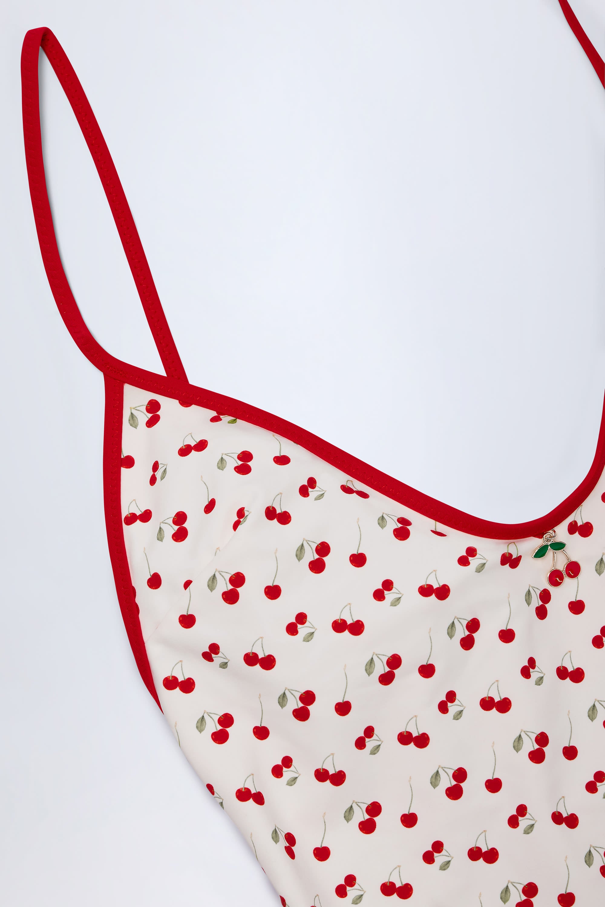 Ostend Charm-Detail Cross-Back Swimsuit in Cherry Print - Image 7