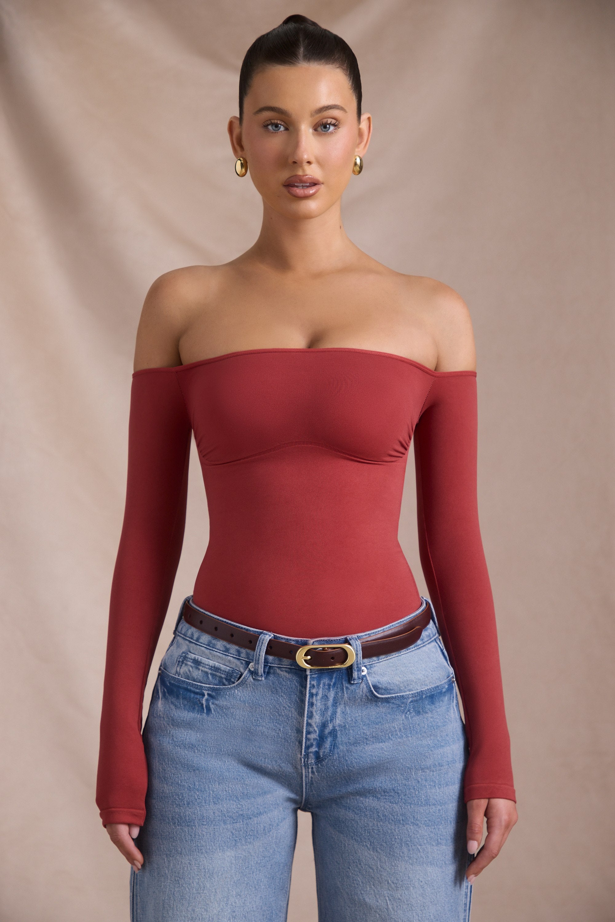 Pammie Seamless Off-Shoulder Long-Sleeve Bodysuit in Brick Red - Image 7