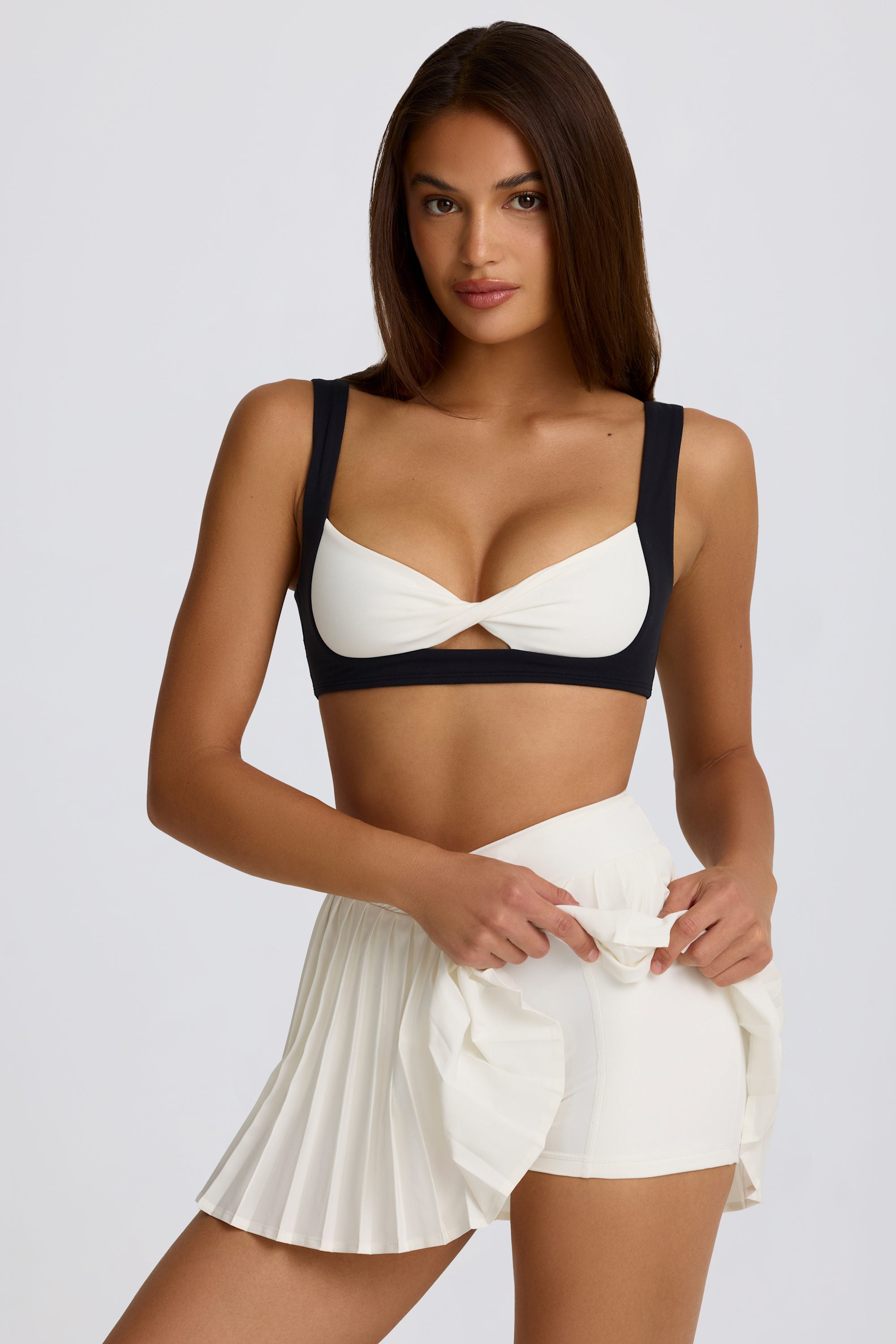 Soft Active Crossover Pleated Mini Skort in Ivory - Image 5