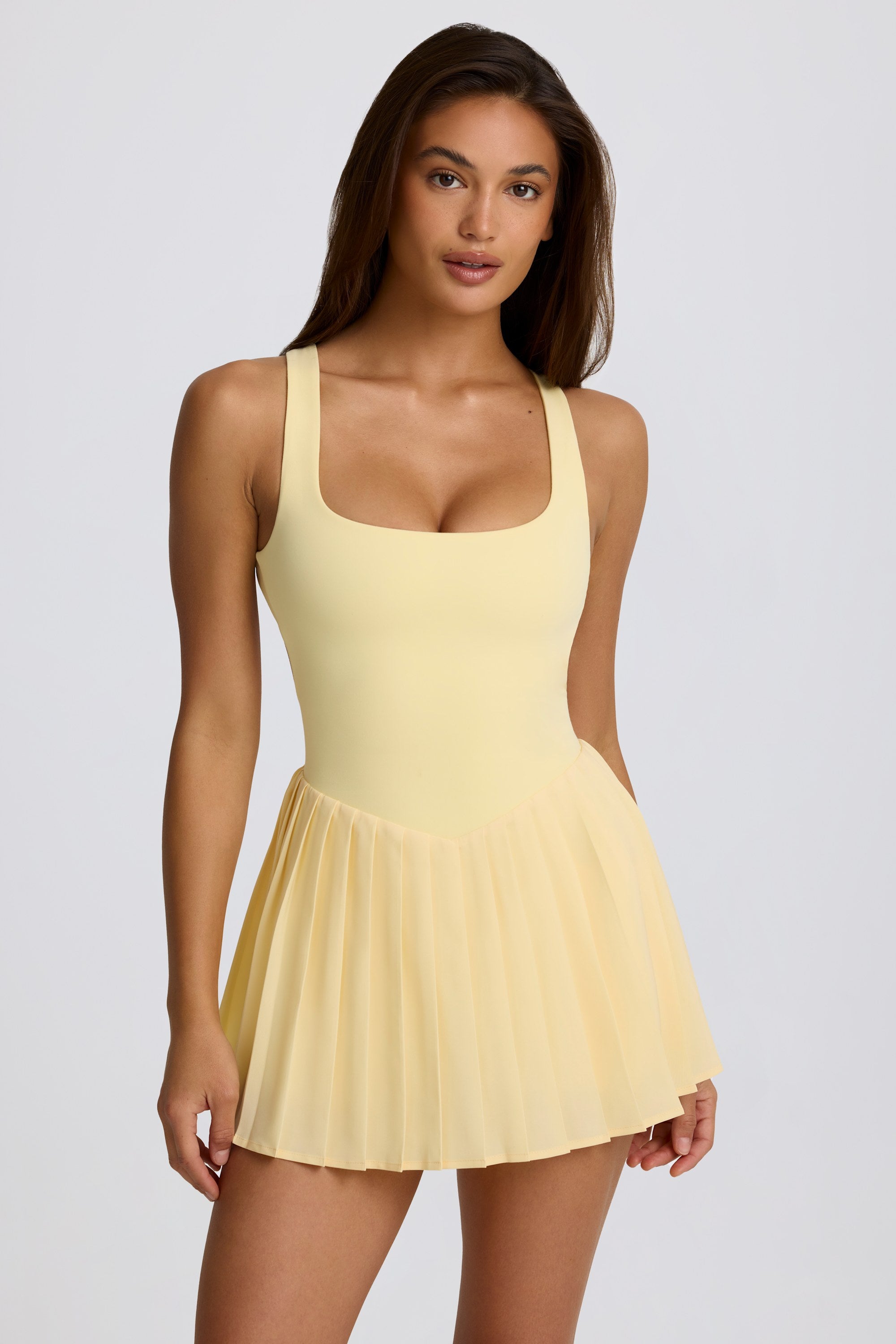 Soft Active Open-Back Pleated Tennis Dress in Lemon - Image 5