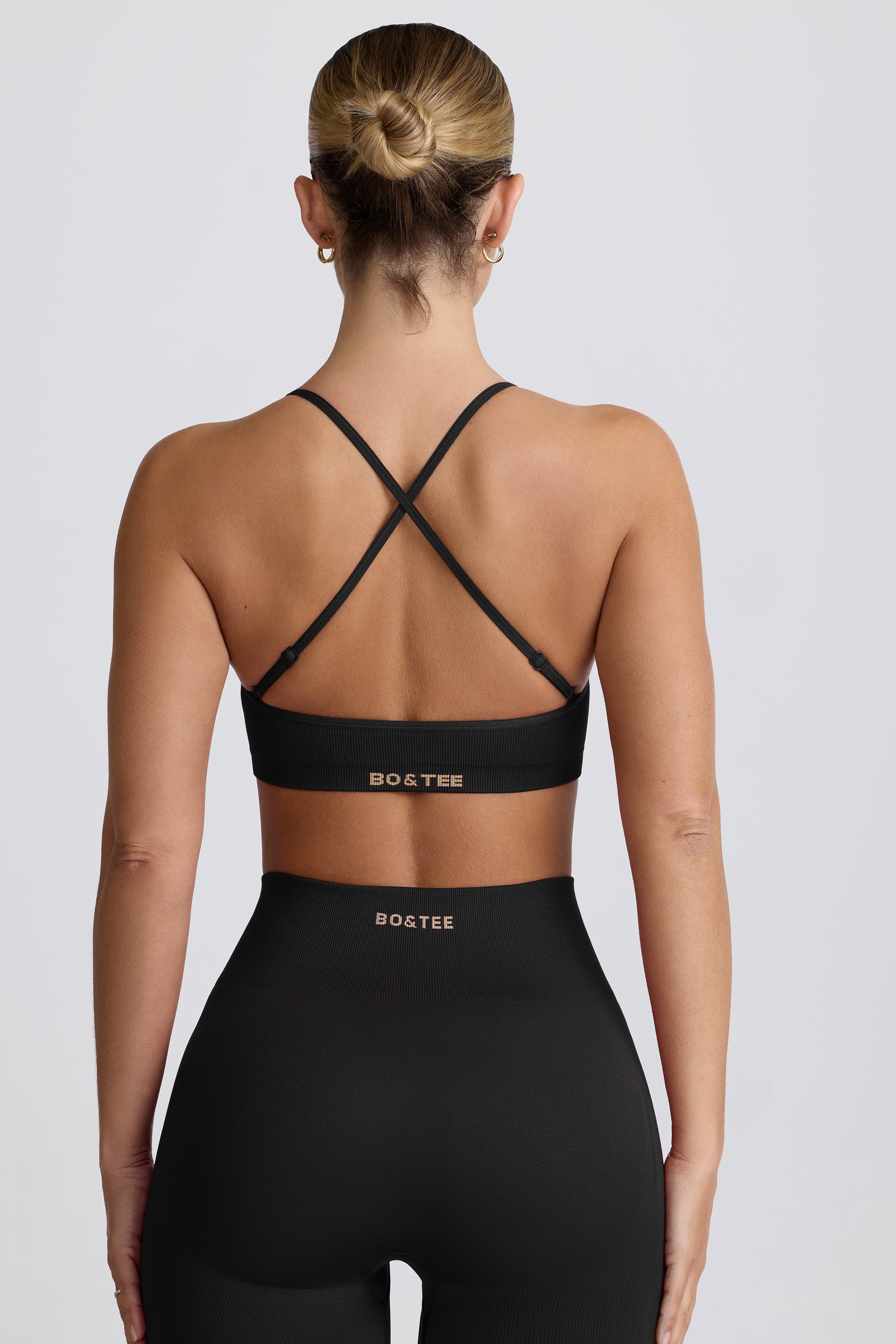 Super Sculpt Seamless Cross-Back Sports Bra in Black - Image 3