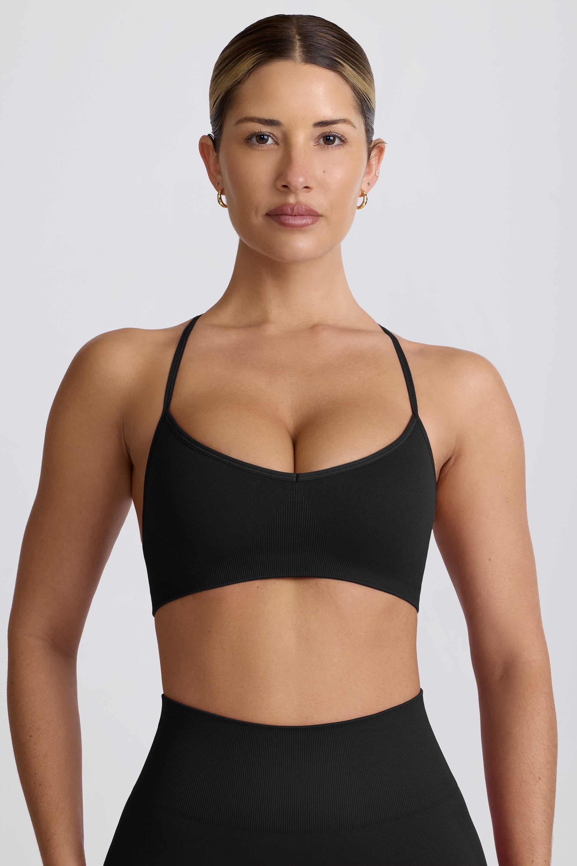 Super Sculpt Seamless Cross-Back Sports Bra in Black - Image 6