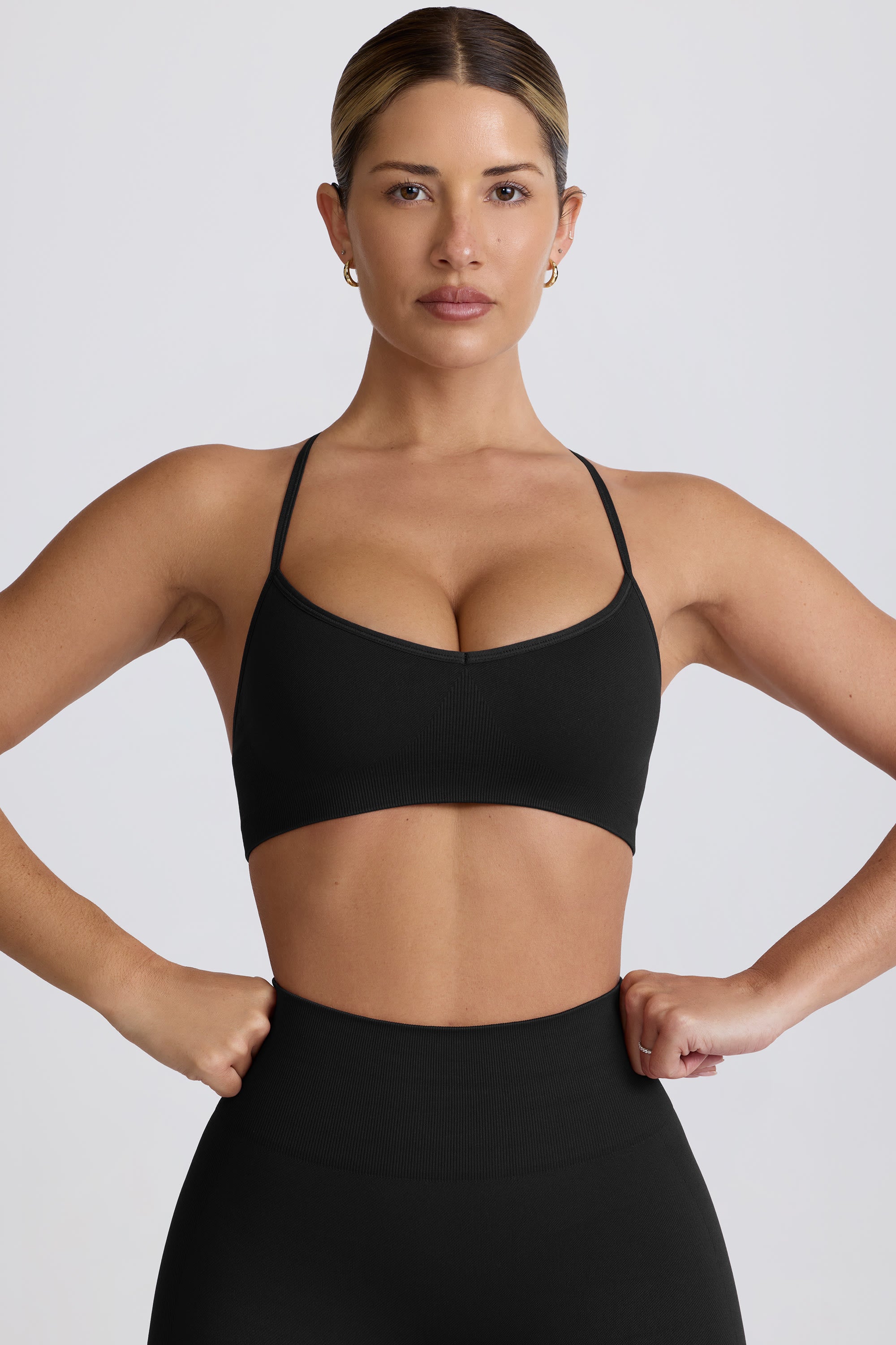 Super Sculpt Seamless Cross-Back Sports Bra in Black - Image 8