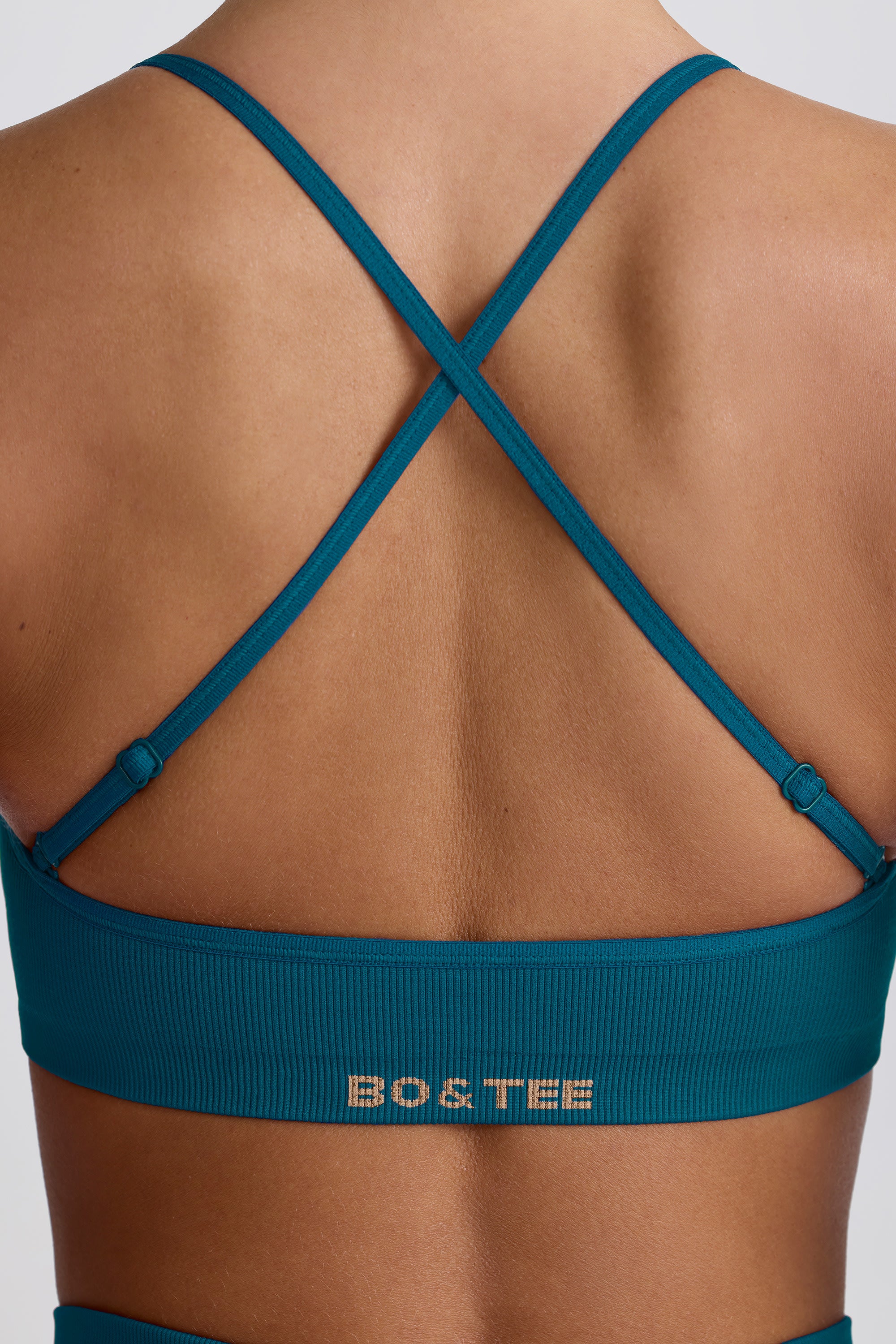 Super Sculpt Seamless Cross-Back Sports Bra in Teal - Image 5