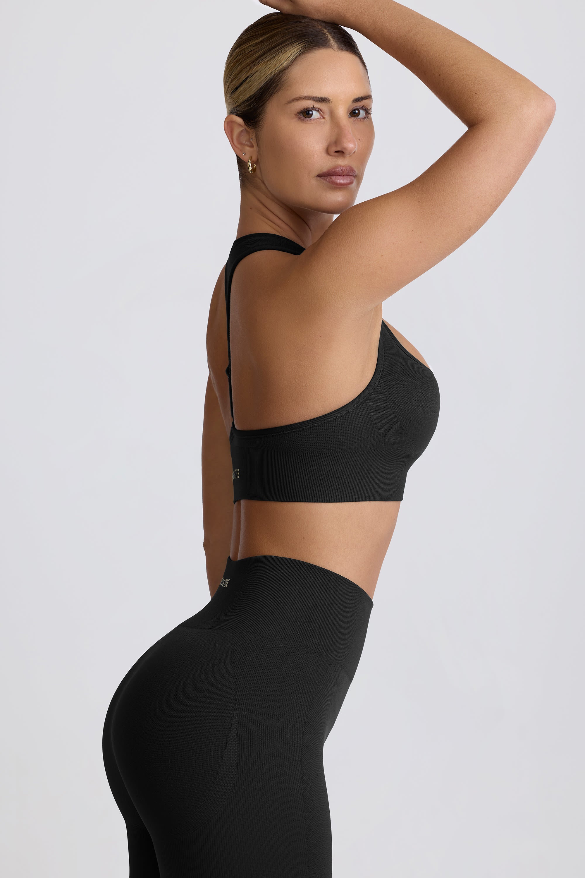 Super Sculpt Seamless T-Back Sports Bra in Black - Image 4