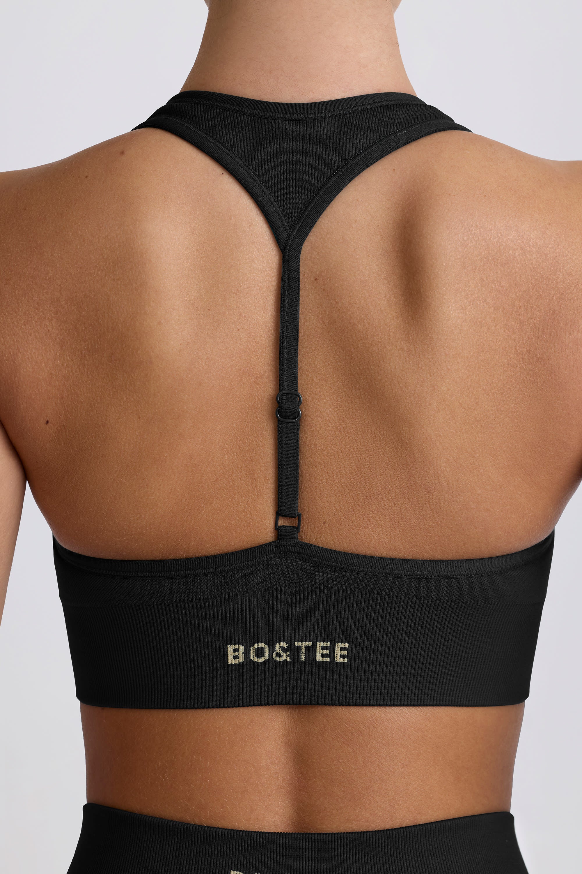 Super Sculpt Seamless T-Back Sports Bra in Black - Image 5