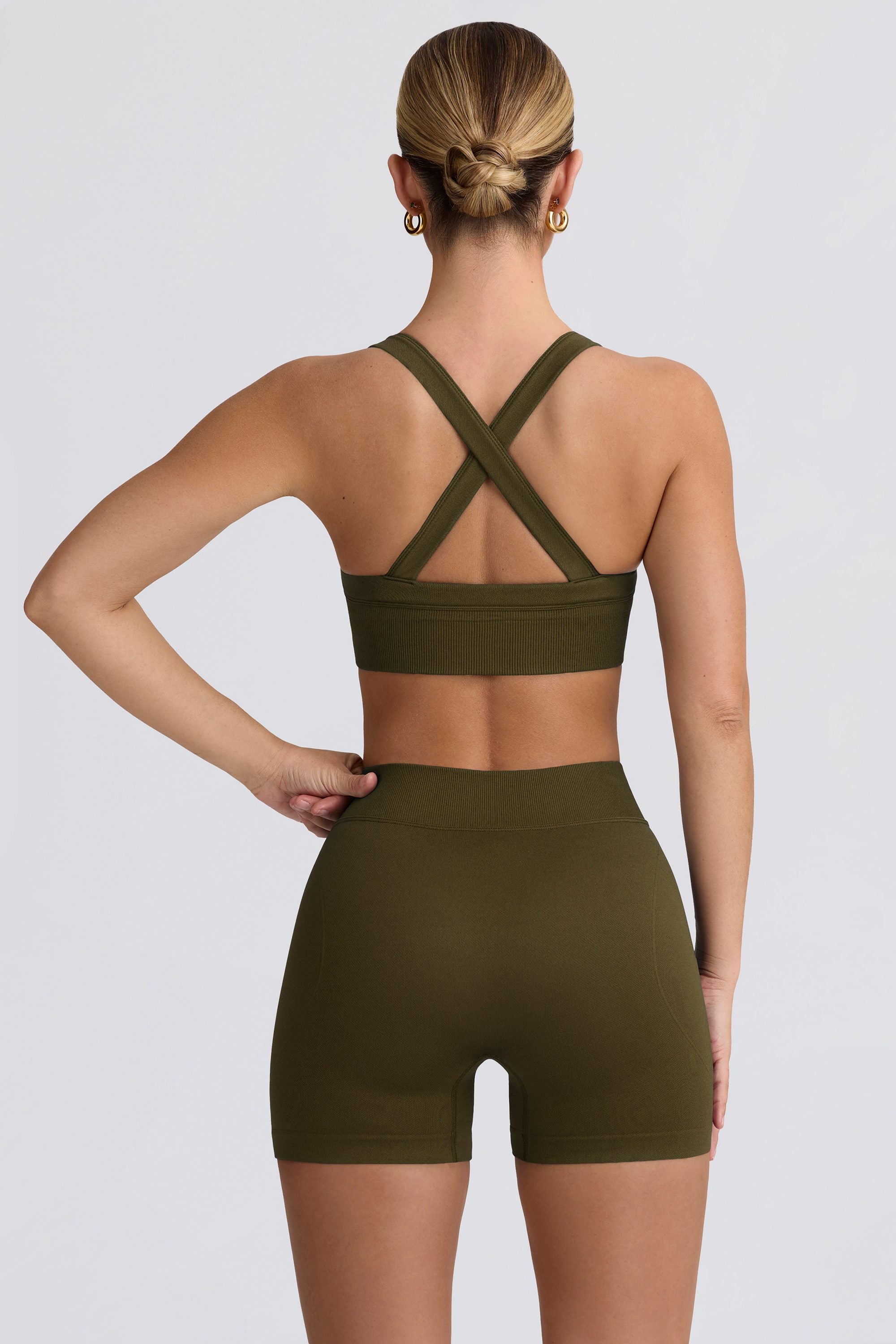 Super Sculpt Seamless Mini Shorts in Dark Green - Image 3