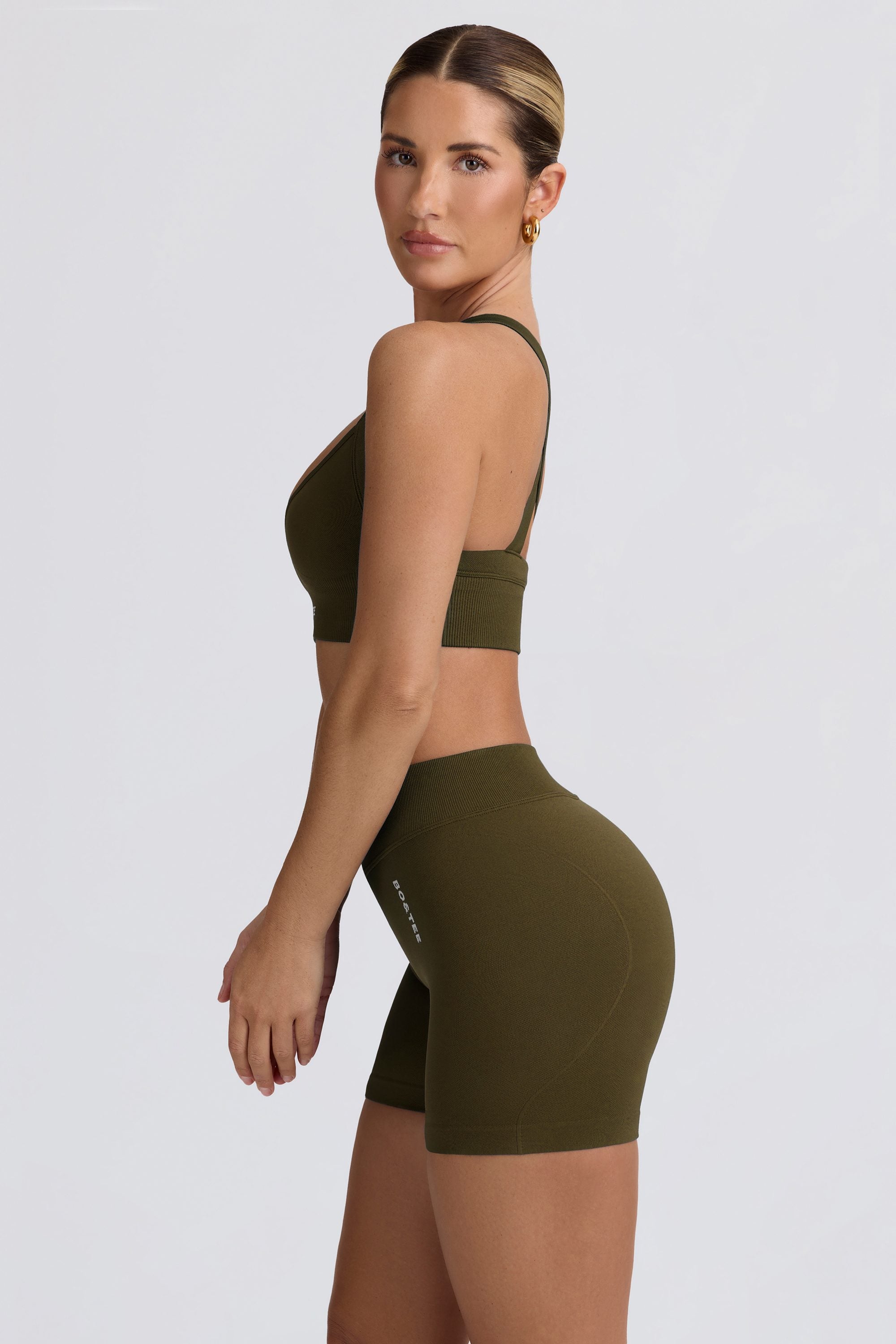 Super Sculpt Seamless Mini Shorts in Dark Green - Image 4
