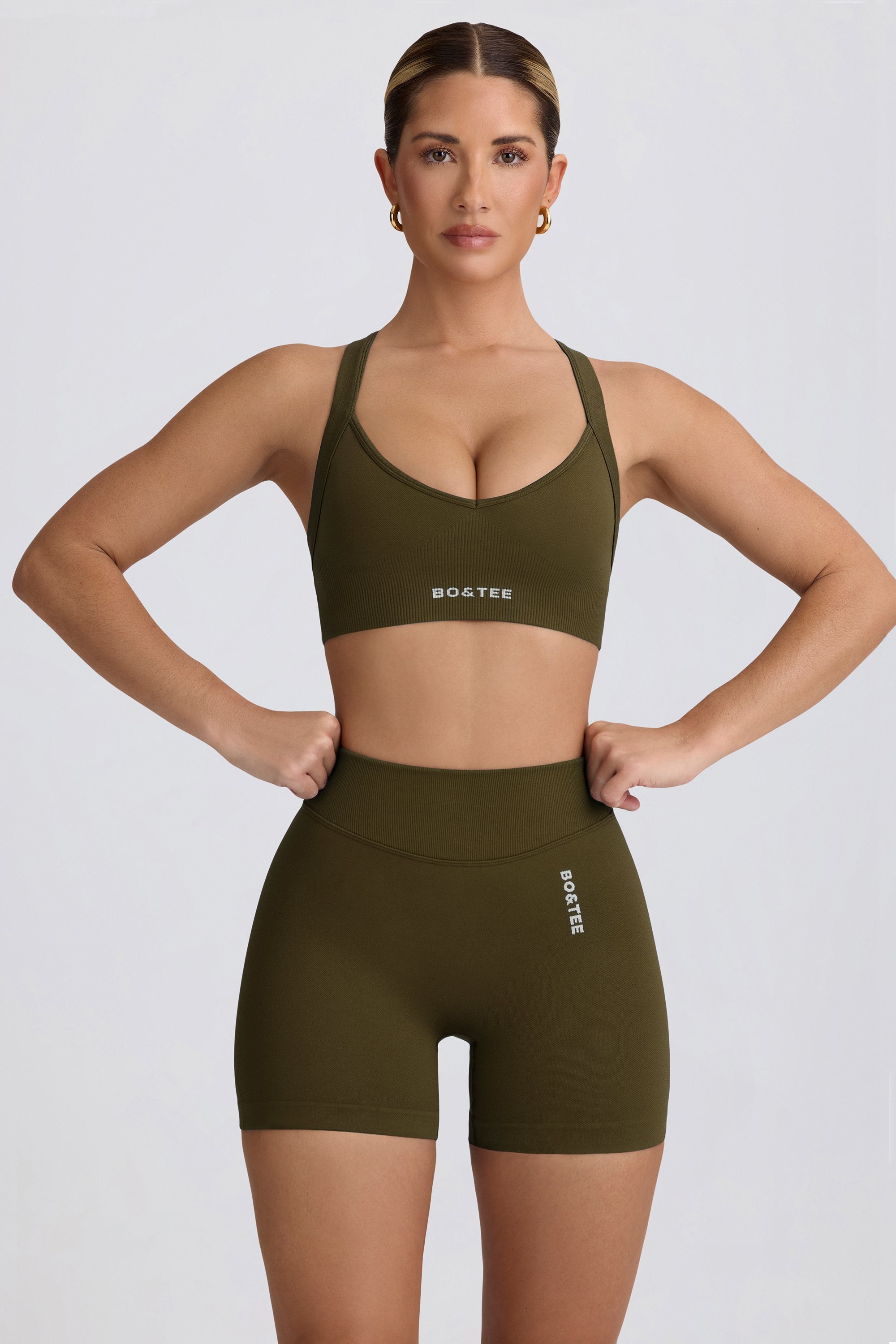 Super Sculpt Seamless Mini Shorts in Dark Green - Image 5