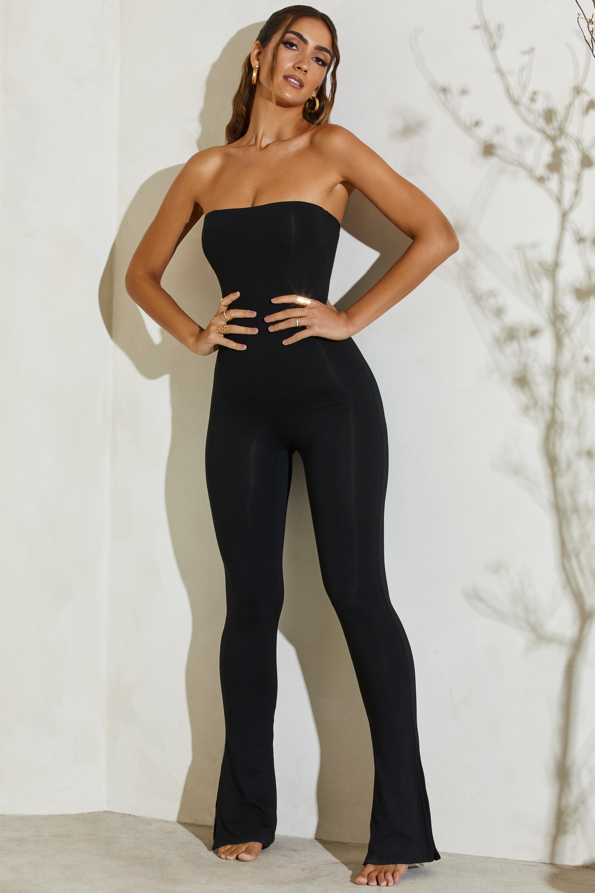 Jamila Strapless Flared Hem Jumpsuit in Black - Image 5