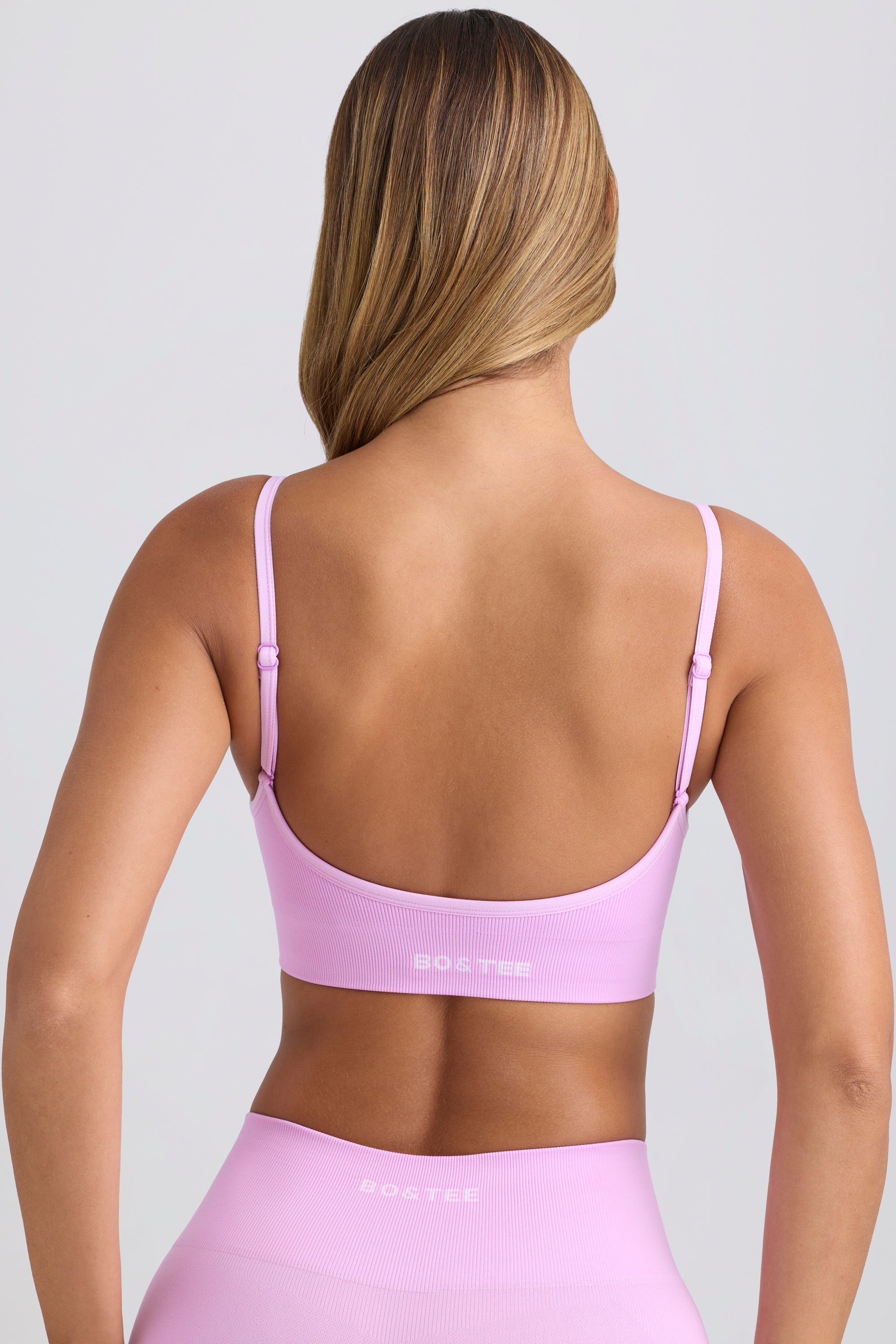 Super Sculpt Seamless Scoop-Back Sports Bra in Violet Pink - Image 2