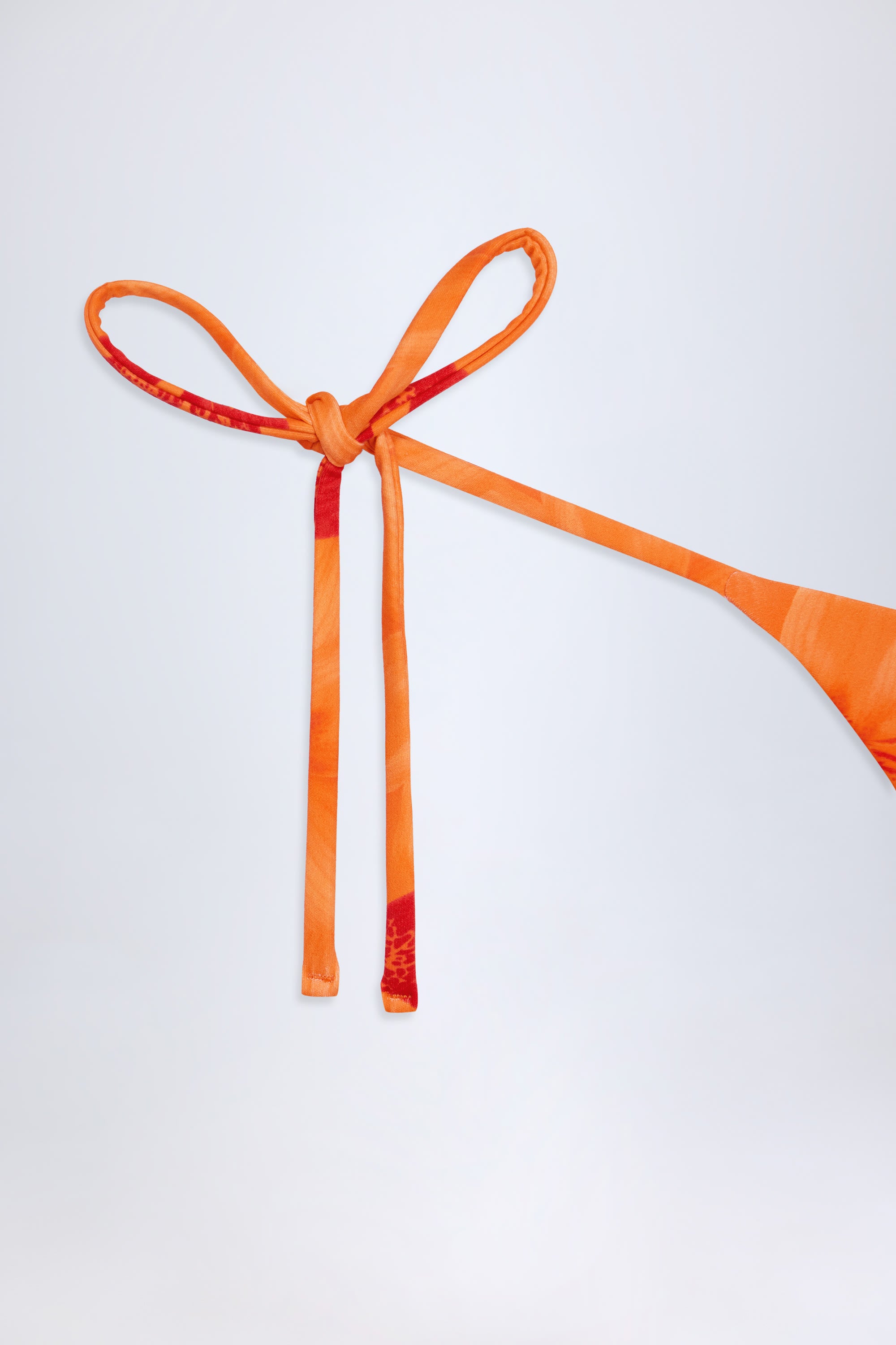 Moheli Side-Tie Thong Bikini Bottoms in Orange Orchid Print - Image 6